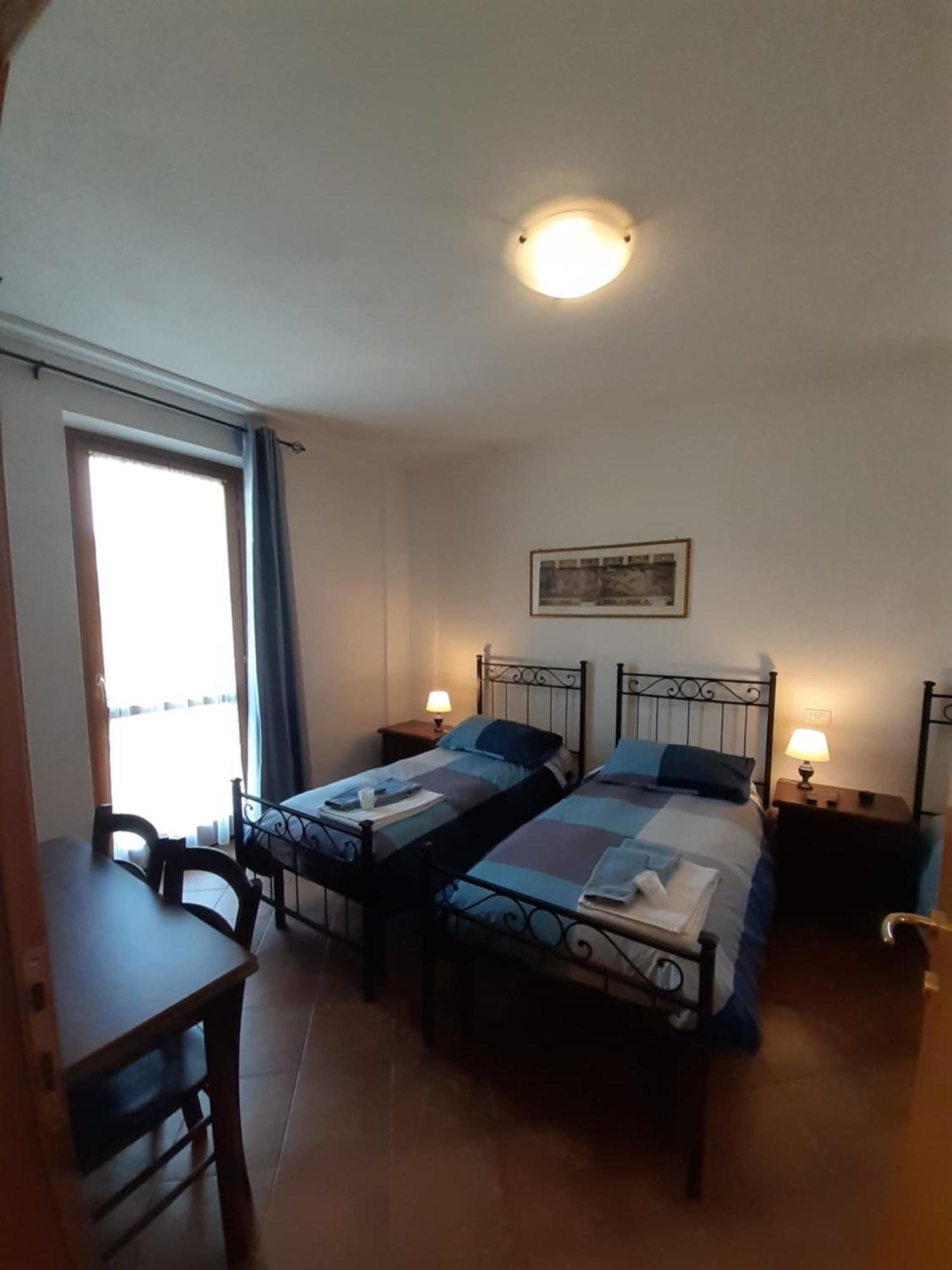 Camera Matrimoniale/Doppia con Letti Singoli con Letto Supplementare